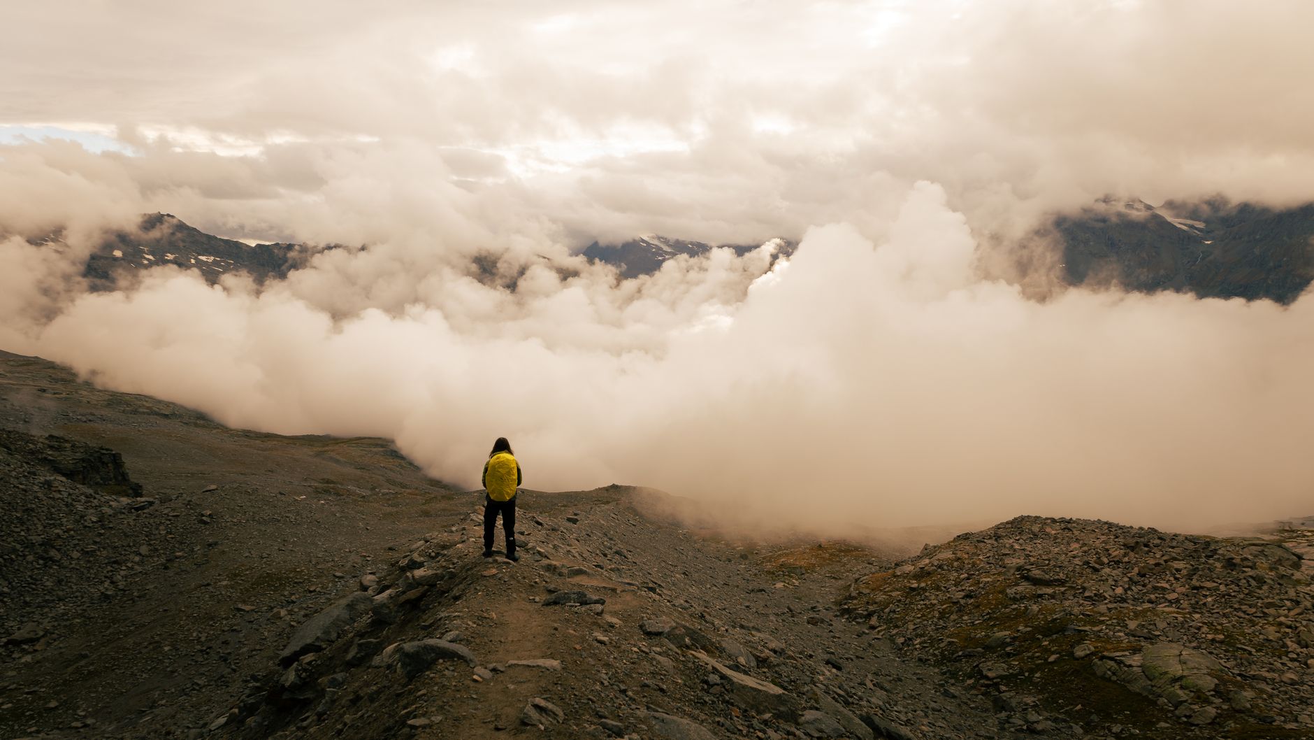 Traveler looking over quiet valley